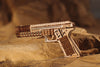 Pistola Defender image-5 Italiano